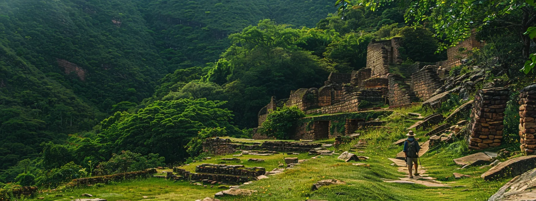 a hiker stands at the base of el fuerte de samaipata, with ancient ruins blending into the lush green mountainside behind them.